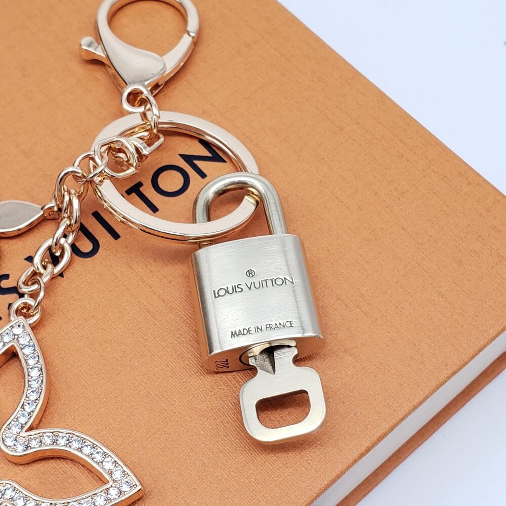 Authentic Louis Vuitton Gold Lock & Box w/ Unbranded Clover Bagcharm - Picture 7 of 9